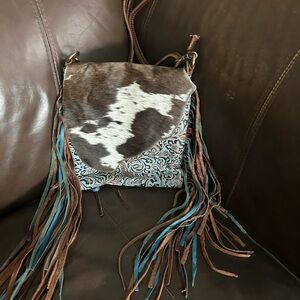 Myra used Fringed Western Cowhide Crossbody Bag in Brown & Turquoise